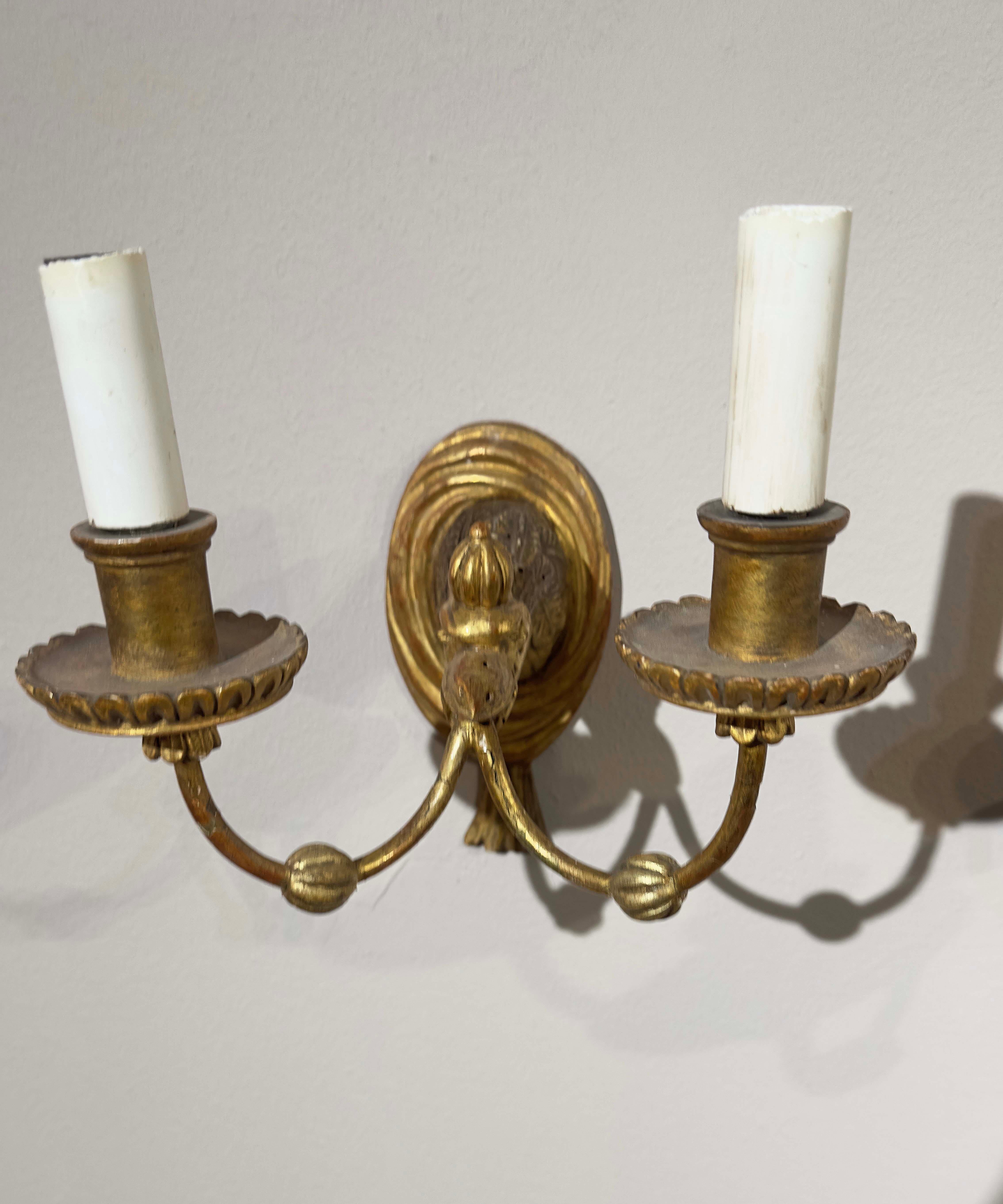 Hand-Carved SECOND HALF OF THE 19th CENTURY PAIR OF GILDED WOOD WALL LIGHTS For Sale
