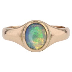 Bague jonc en or jaune 18 carats avec opale de deuxième main