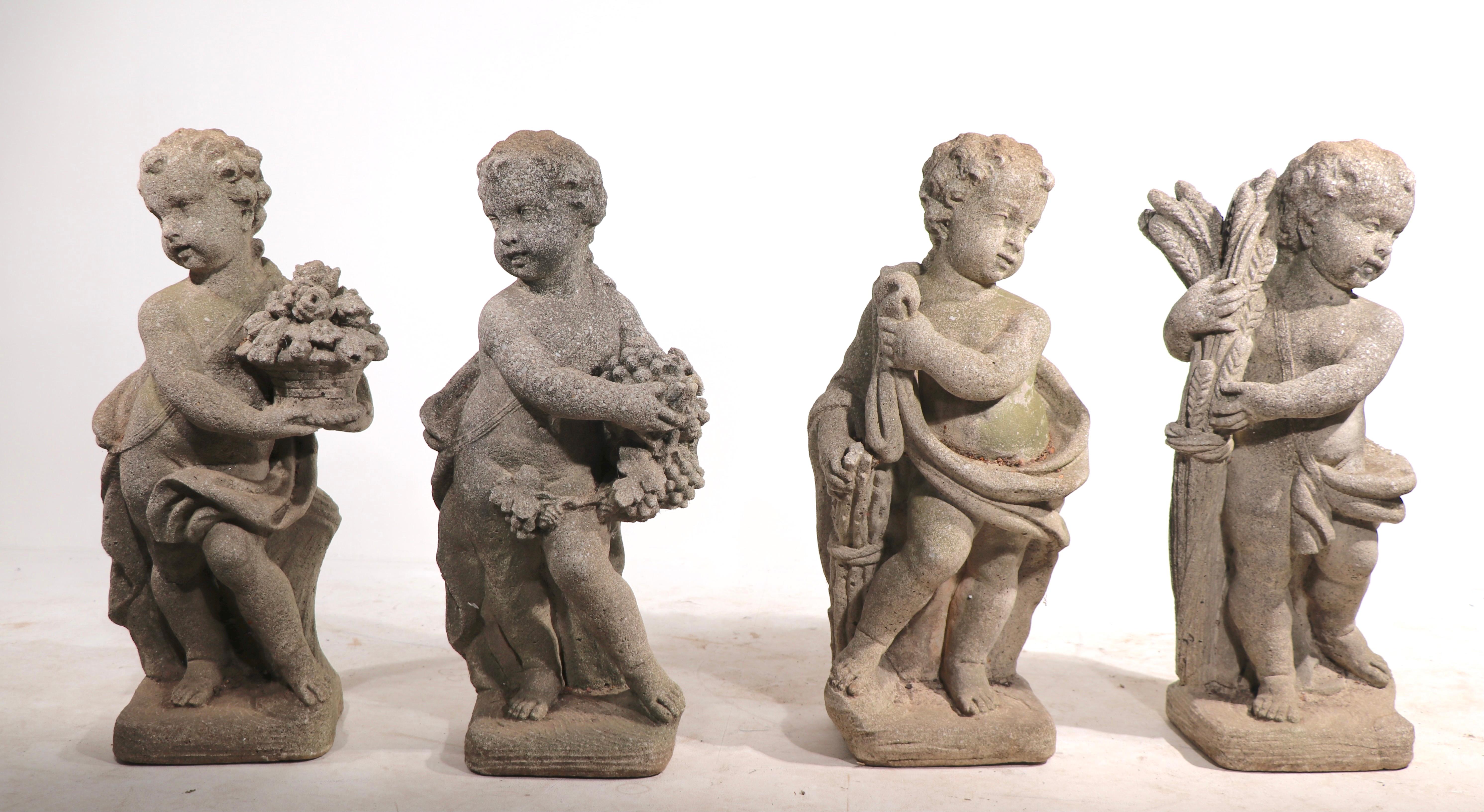 This is the listing for the second payment. 
Nice complete set of vintage cast stone garden statues depicting mythological putti form representations of the four seasons. All four are in very good original condition, all have a charming organic