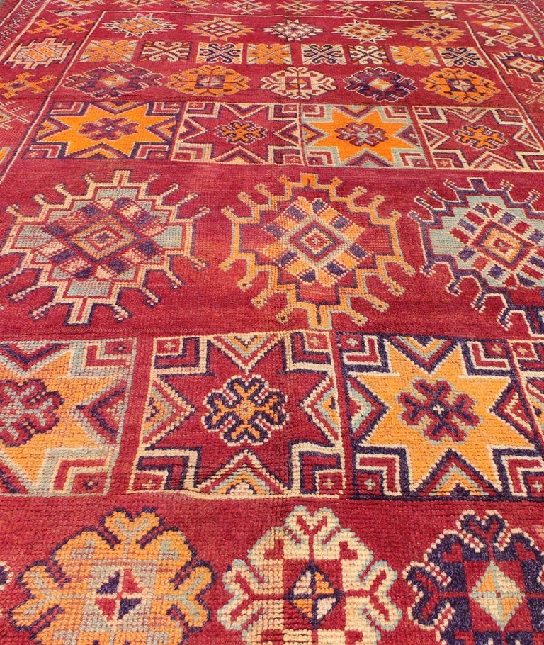 Wool Antique Moroccan Rug in Crimson Red, Orange, Blue and Yellow