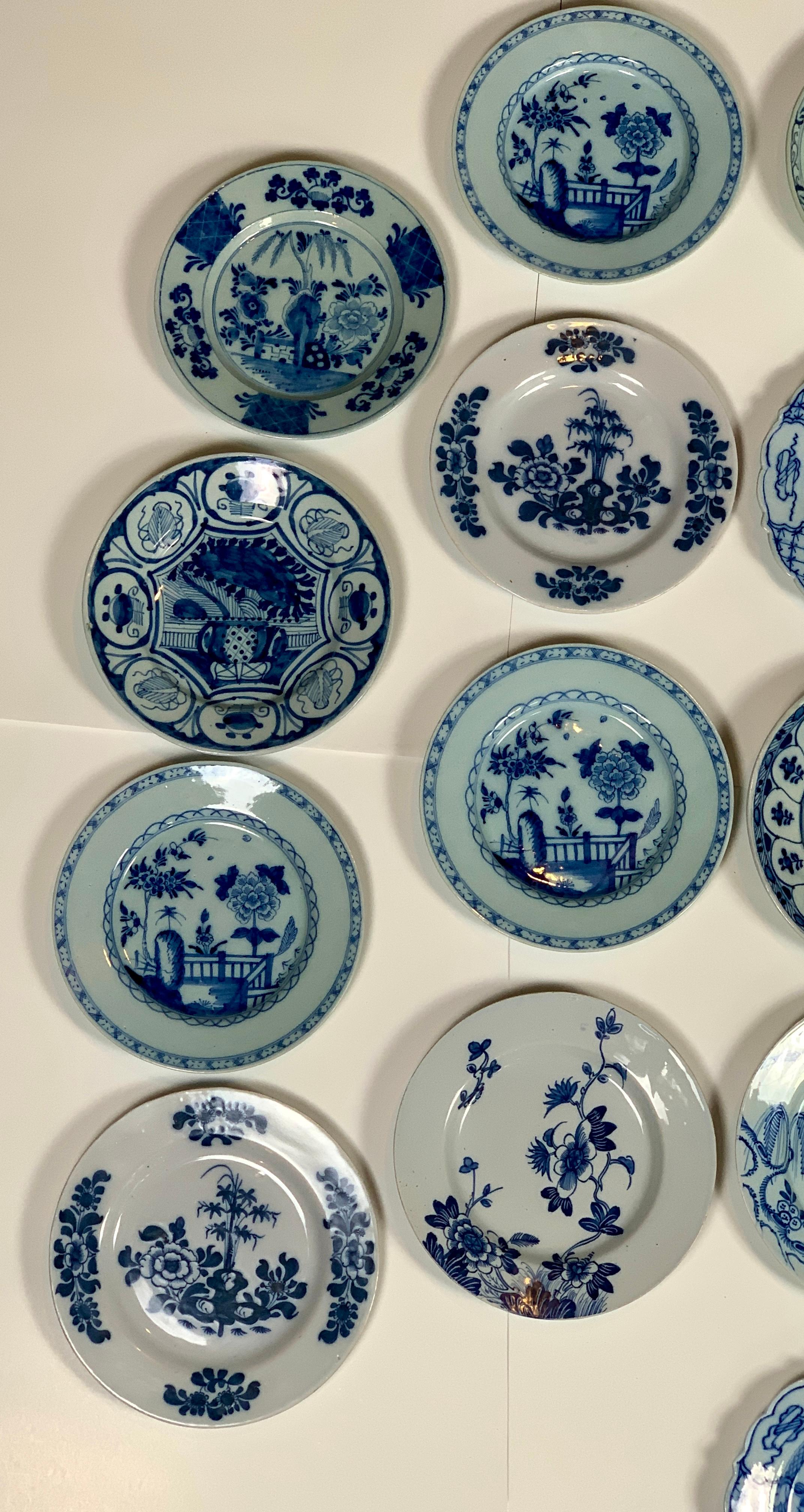 A set of 21 blue and white Delft plates 8.75-9.25