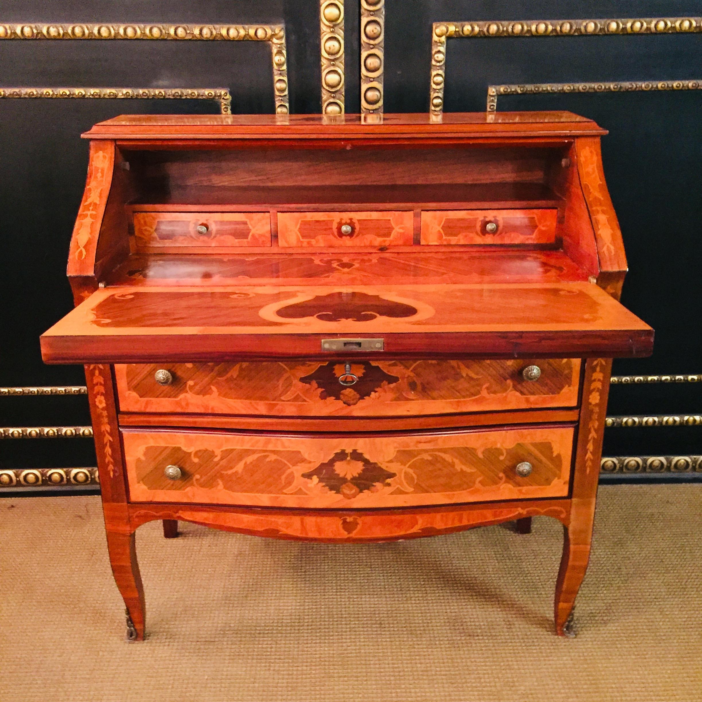 Secretaire Baroque style made in Italy with Inlays.
3 drawers above a plate to open as a writing surface,
There are 3 small drawers behind the plate.

Dimensions.
Width: 90cm
Height: 96cm
Depth:41cm
Height to the writing surface 74cm.