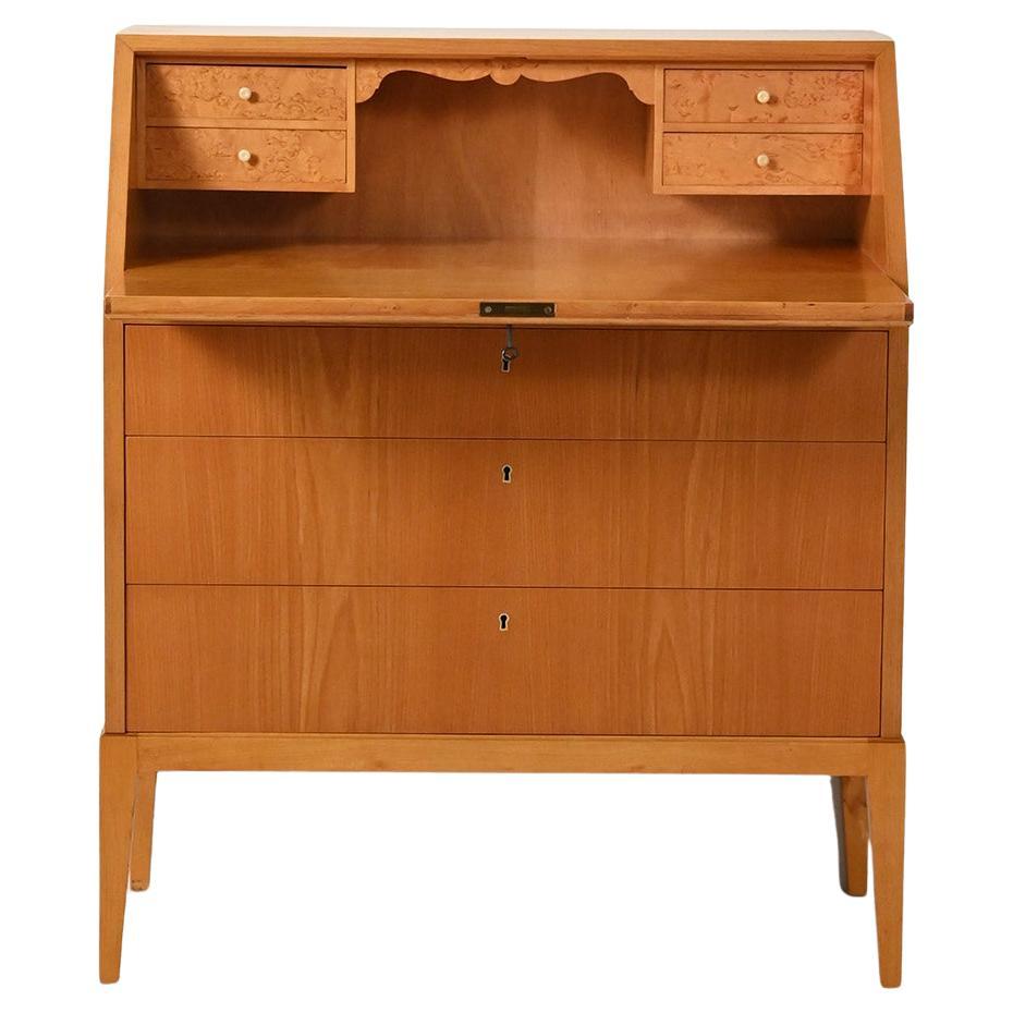Secrétaire scandinavo in olmo e radica, anni ’50