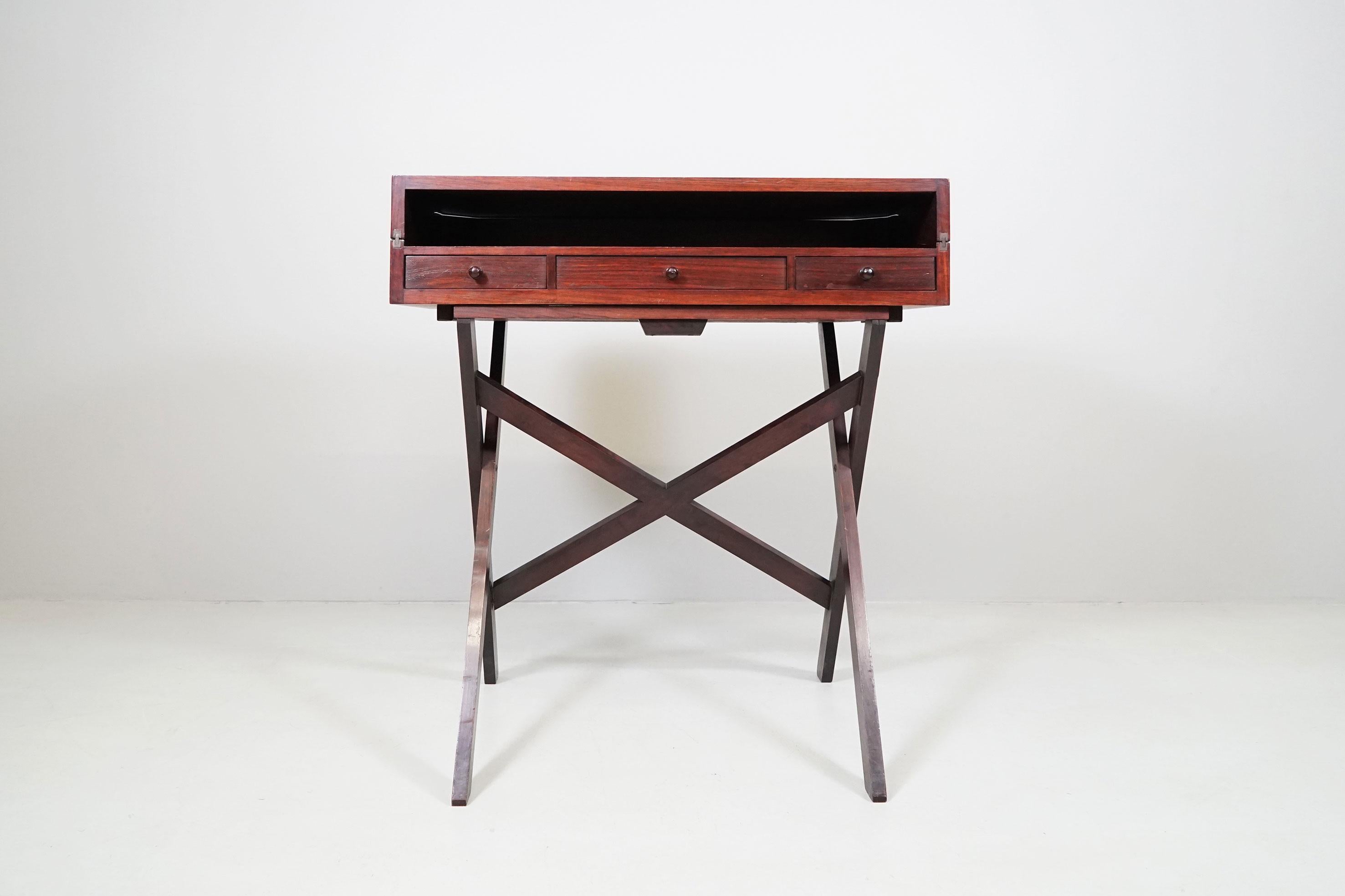 This beautiful secretary by Gianfranco Frattini from 1954 was made out of rosewood. 
Frattini was an italien architect and designer.

