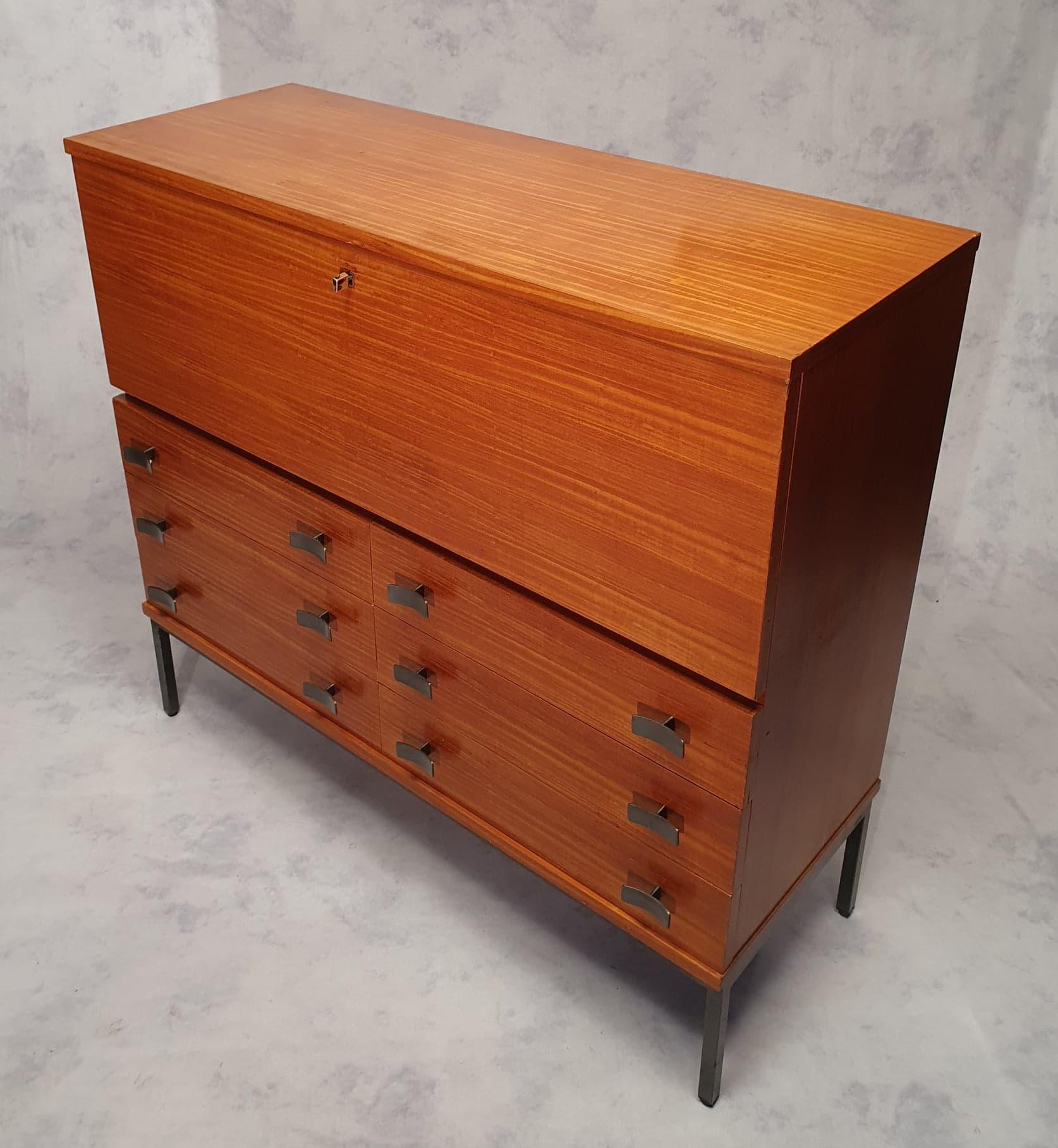 Magnificent modernist secretary by Antoine Philippon and Jacqueline Lecoq edited by Degorre in 1957. Exceptional work in satin ribbon and lacquered metal. Modernist pearl, the work of Philippon and Lecoq is focused on minimalist and elegant lines.