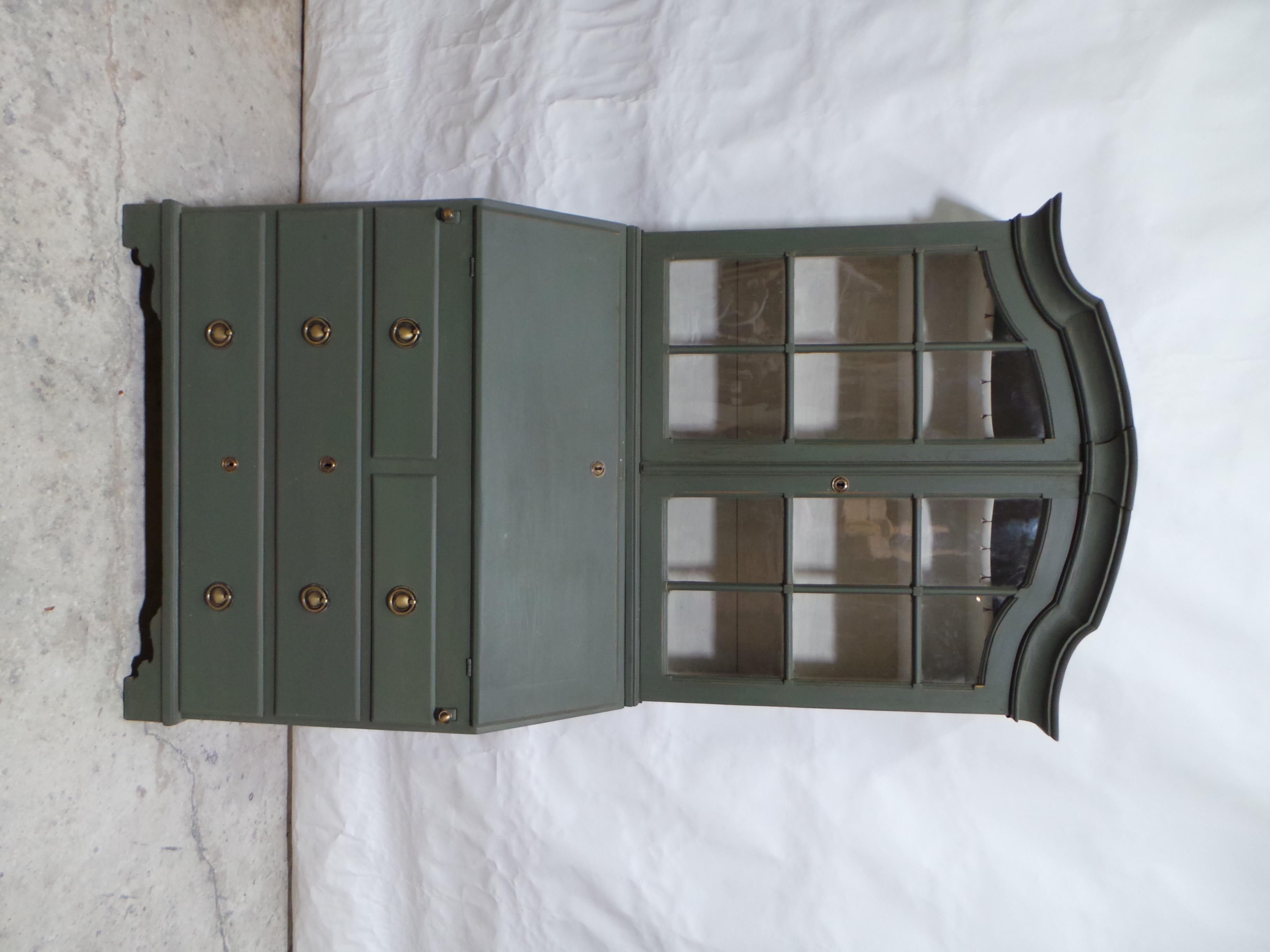 This is a unique Swedish Rococo style Secretary  Hutch. its been restored and repainted with Milk Paint.