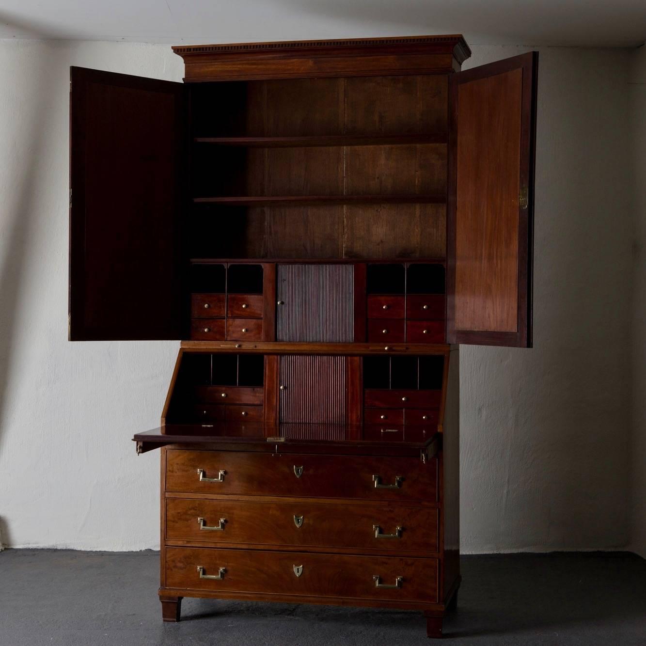 A secretary made during the 18th century in Sweden. The pieces is a so called master piece that made by Carl Frick to this craftsmanship diploma. Its made in a beautiful mahogany with stunning details such as a parquetted flooring in the mid