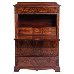 Segretaria a quattro cassetti in mogano con struttura ad intarsio e fiamma