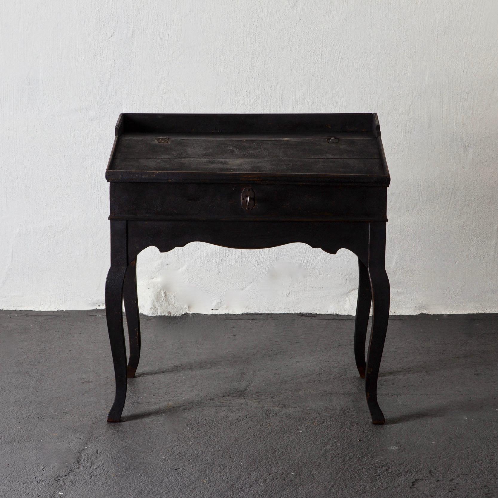 Secretary writing desk Swedish black blue interior, 18th century, Sweden. A secretary made during the 18th century repainted in our Laserow Black with a faded blue interior. Cabriole legs. Measures: Height to apron: 22”.

 