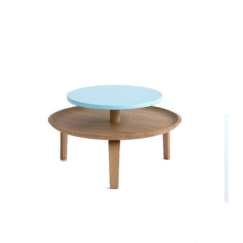 Secreto 60 coffee table, Azure “Cypre” by Colé Italia
Dimensions: H.32; base plate ø 60 top ø 45 cm
Materials: Coach table with 2 rounded plates; 3 legs and base plate in natural solid oak;
top matt lacquered in 5 colors.

Also available: