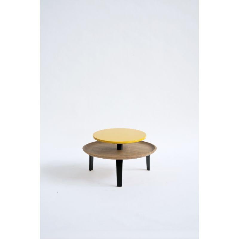 Secreto 85 coffee table, Yellow “Mitzouko” by Colé Italia
Dimensions: H.32; base plate ø 85, top ø 60 cm
Materials: Coach table with 2 rounded plates; 3 legs and base plate in natural solid oak;
top matt lacquered in 5 colors.

Also Available: