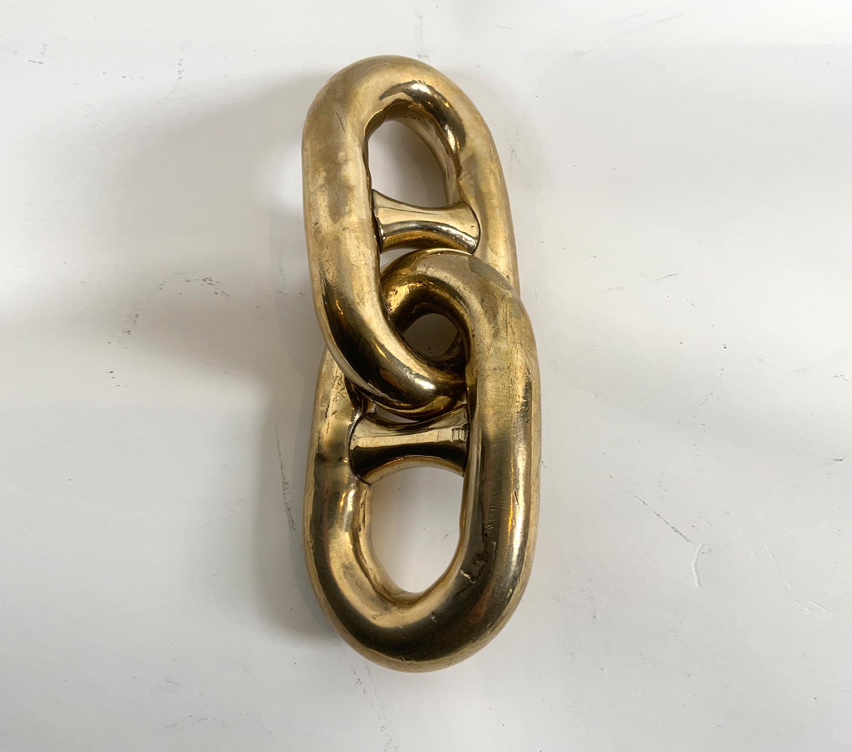 Double chain link from a U.S. Navy Minesweeper. Highly polished and lacquered. Great nautical accent.

Weight: 6 lbs
Overall Dimensions: 12