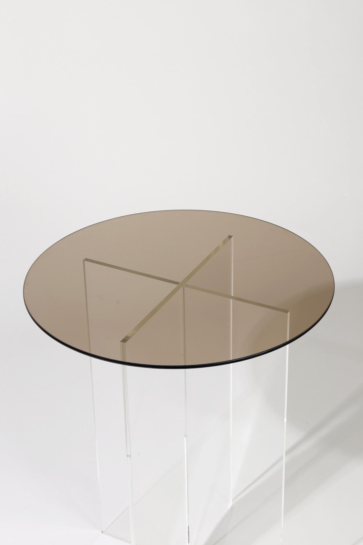Made to order. Please allow 6 weeks for production.

The section side table is designed with clear vertical structures that give the appearance of floating horizontal spans. The effect is subtle with all clear glass or can be accentuated with