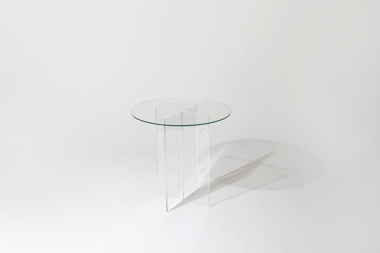 Made to order. Please allow 6 weeks for production.

The Section side table is designed with clear vertical structures that give the appearance of floating horizontal spans. The effect is subtle with all clear glass or can be accentuated with