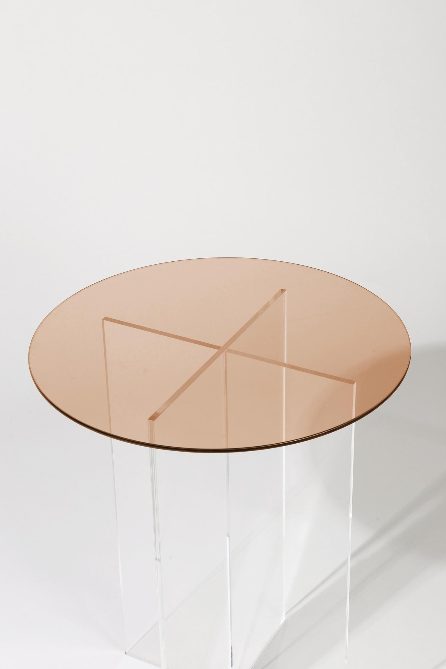 Made to order. Please allow 6 weeks for production.

The Section side table is designed with clear vertical structures that give the appearance of floating horizontal spans. The effect is subtle with all clear glass or can be accentuated with