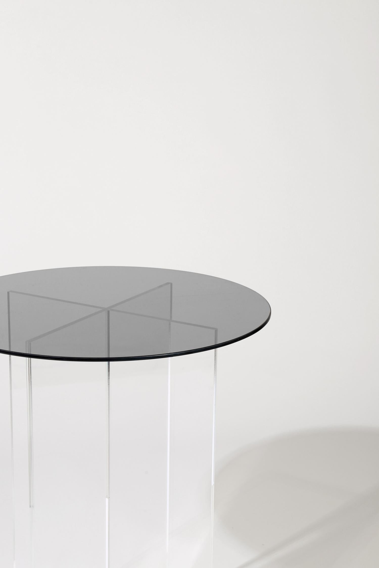 Made to order. Please allow 6 weeks for production.

The section side table is designed with clear vertical structures that give the appearance of floating horizontal spans. The effect is subtle with all clear glass or can be accentuated with