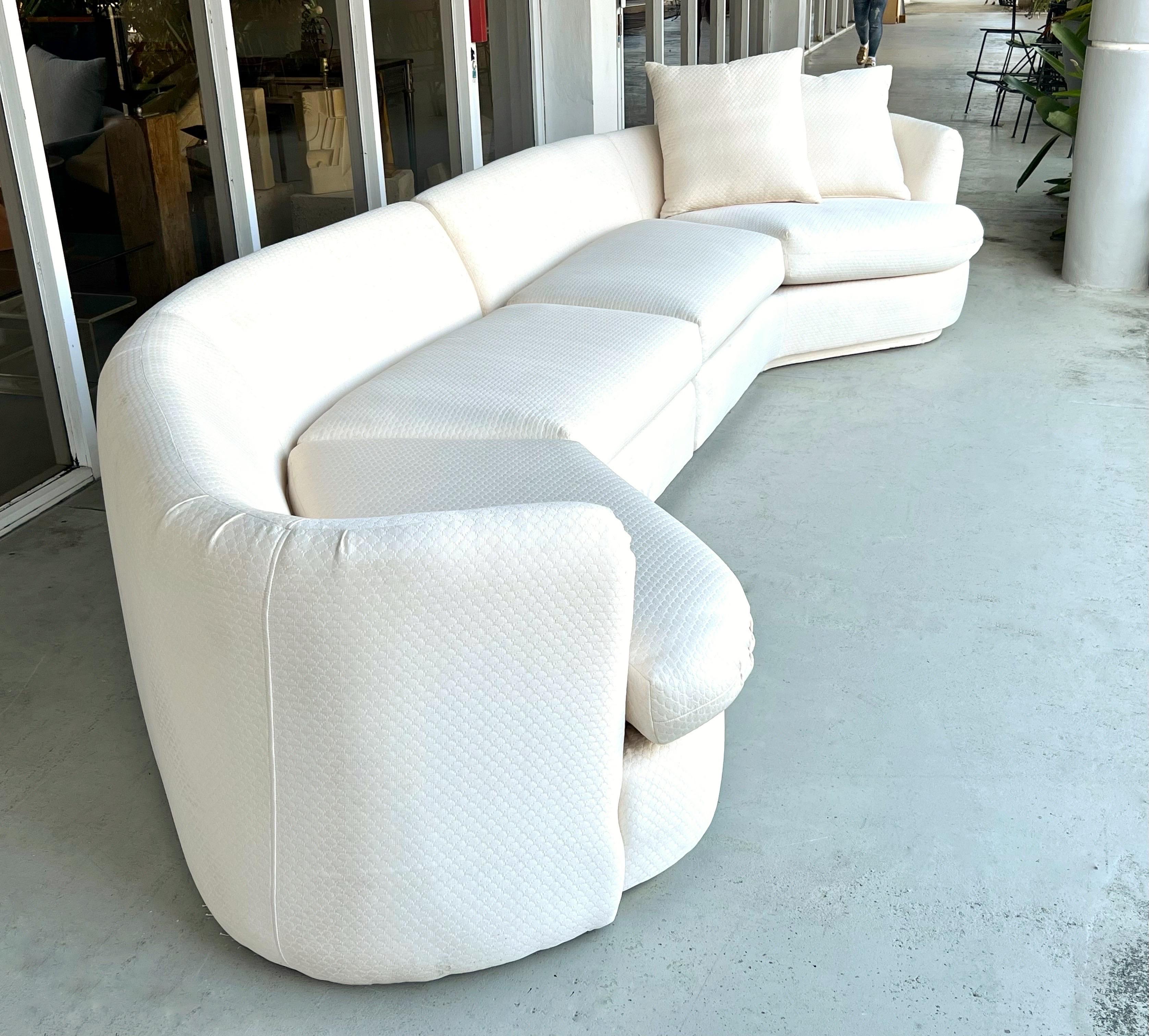 A 2 part sectional sofa. Very sophisticated design, the shape is angular and curved at the same time that creates an inviting yet not restricting or enclosing environment. Clean modern lines, great looking from every point of view.