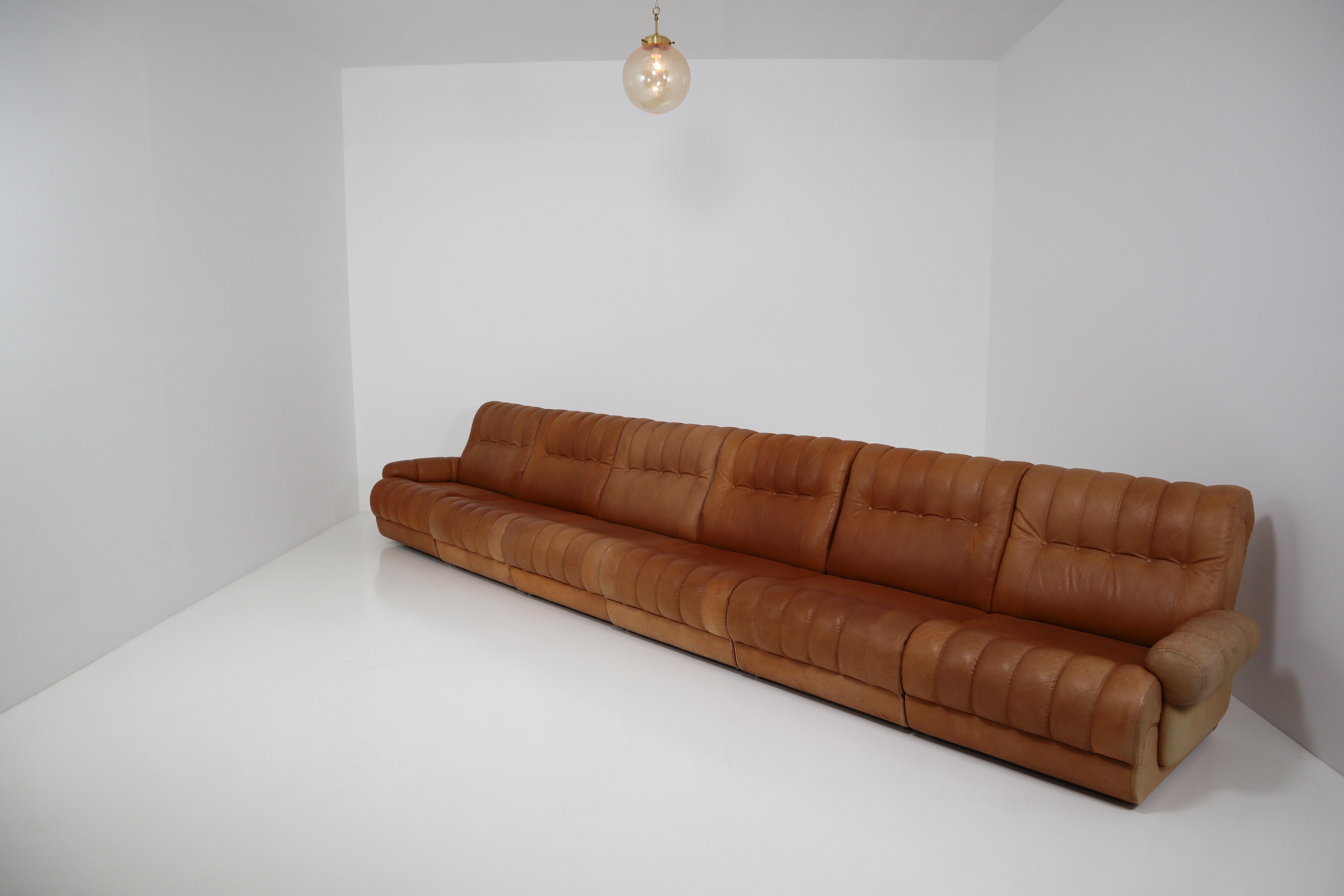 Sectional Sofa and Matching Ottoman in Patinated Cognac Leather Holland 1970s In Good Condition In Almelo, NL