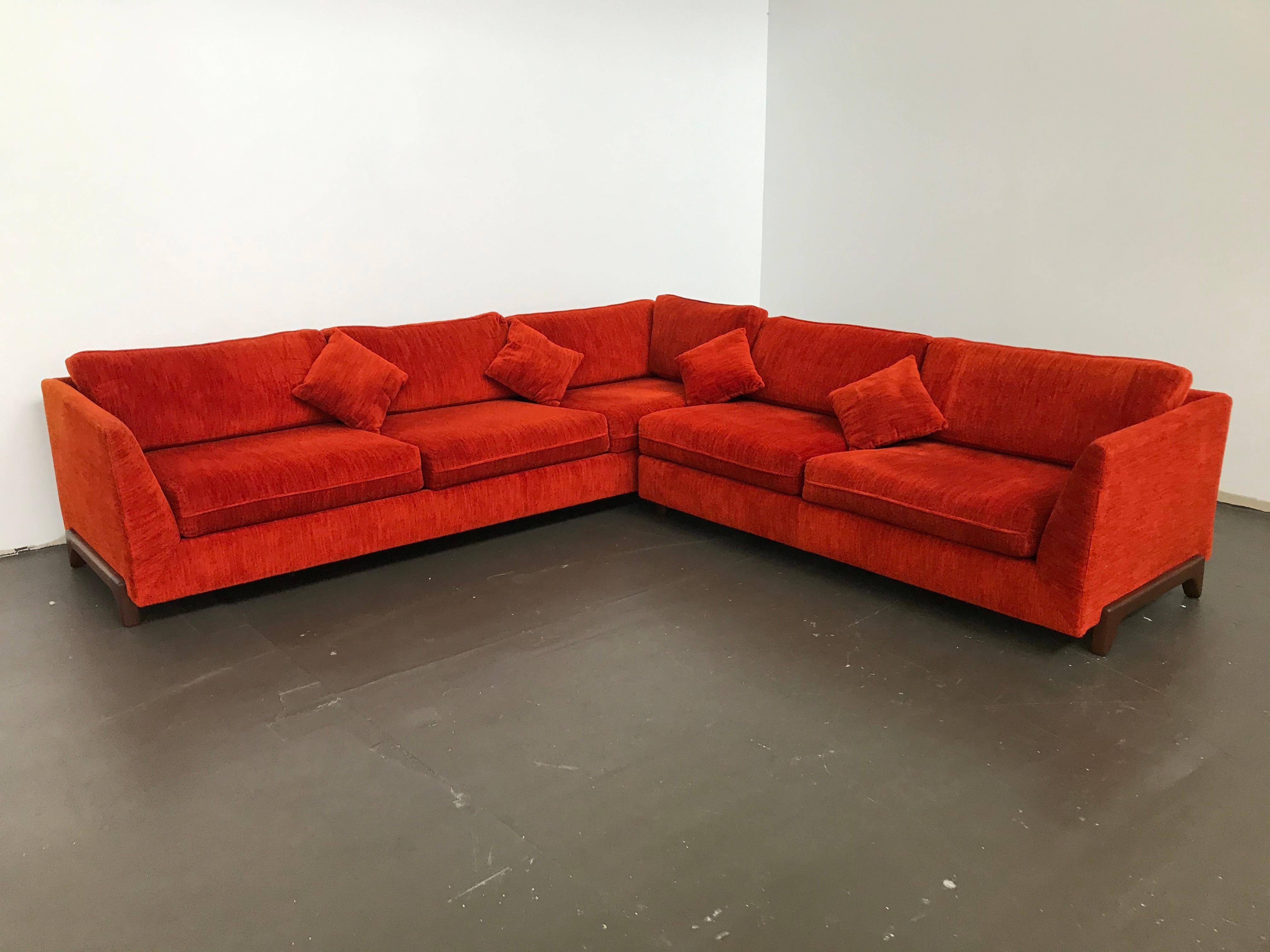 L shaped sectional by Adrian Pearsall for craft Associates, 1960s. Walnut legs have been restored. Not sure if that is the original orange/rust crushed velvet upholstery - but it not a new upholstery job. The sofa displays nicely as-is but