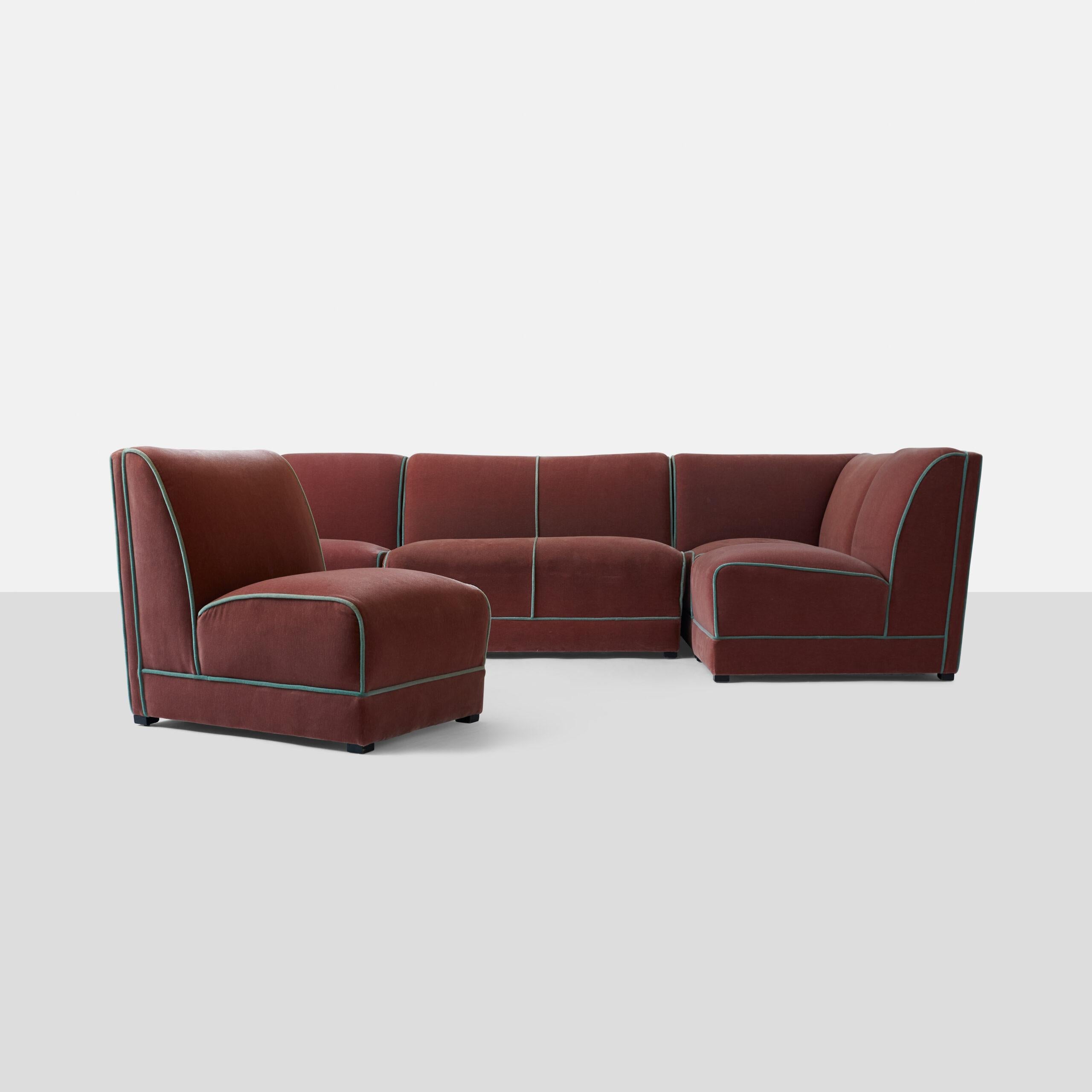A five piece sectional sofa consisting of one corner piece, a settee and three single chairs. Rohde's Combination Chairs represented the first modular furniture system introduced to the American market, along with his important East India Laurel