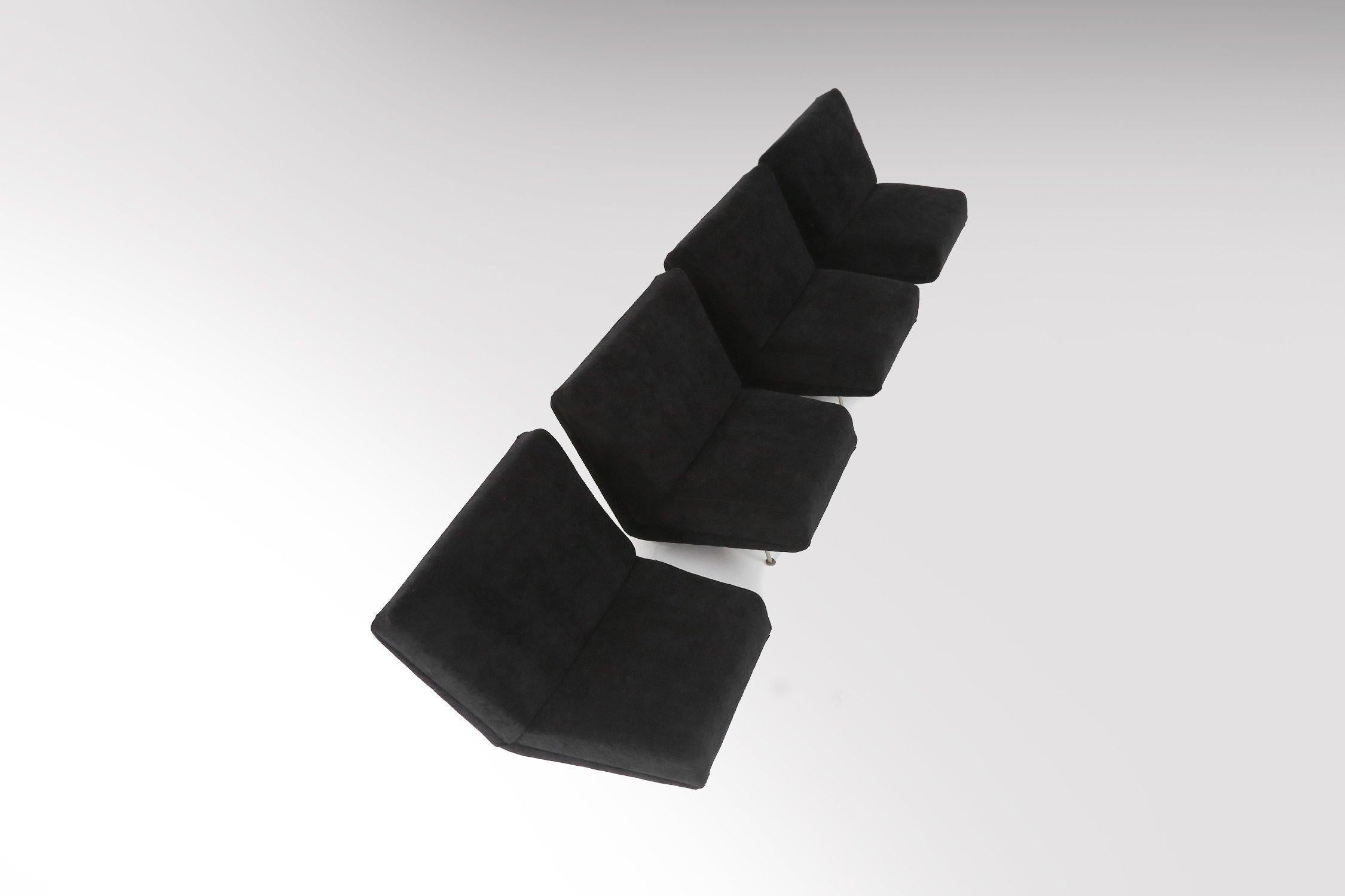 Modular seating group by Dutch designer Theo Ruth for Artifort in the 1950's. The four elements can be used separately or can be combined together as a four-seat sofa. These chairs have a wooden structure with traditional coil springs in the