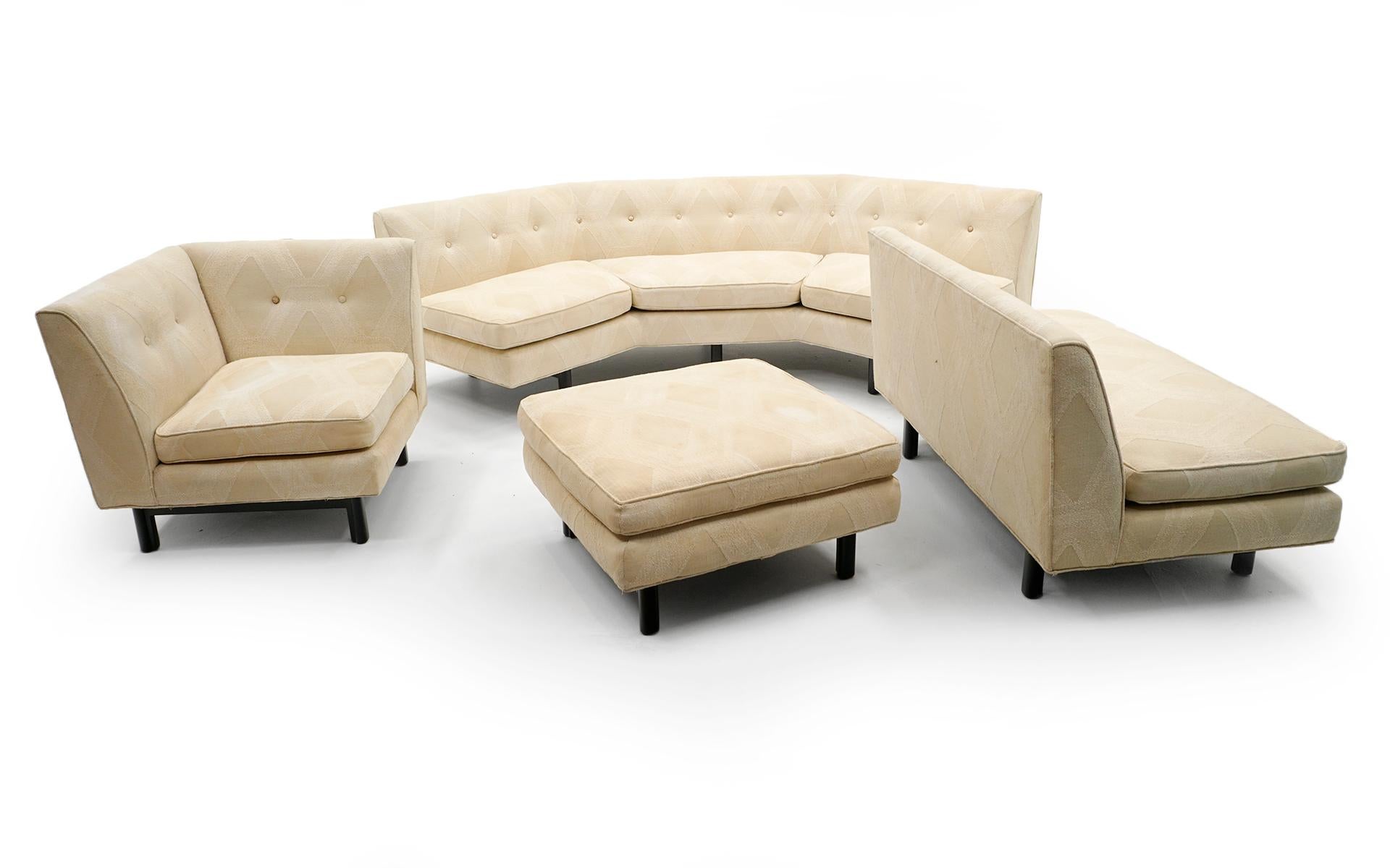 Four piece sectional sofa designed by Edward Wormley for Dunbar, 1950s. Curved center / corner section plus two seat section, one seat section and one ottoman. This can be configured multiple ways with the armed piece on either end. Can also creat a