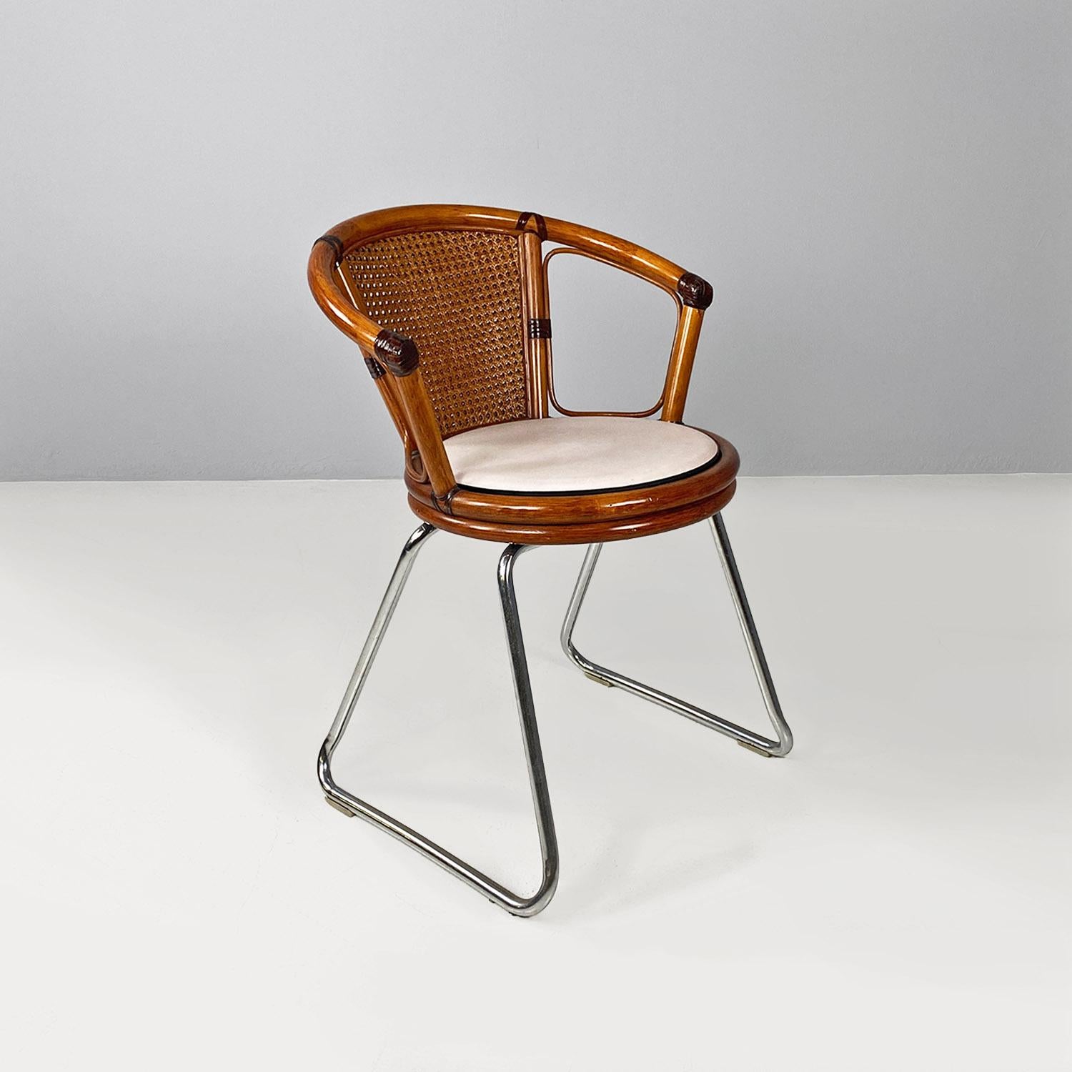 Cockpit chair, modern Italian, made of vienna straw wood and steel, ca. 1970.
Cockpit chair, with Vienna straw seat and back and curved wood to form the seat frame, finished with a round white cushion and armrests. The trapezoidal-shaped legs are