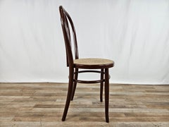 1970s brown lacquered wood chair with Vienna straw seat
