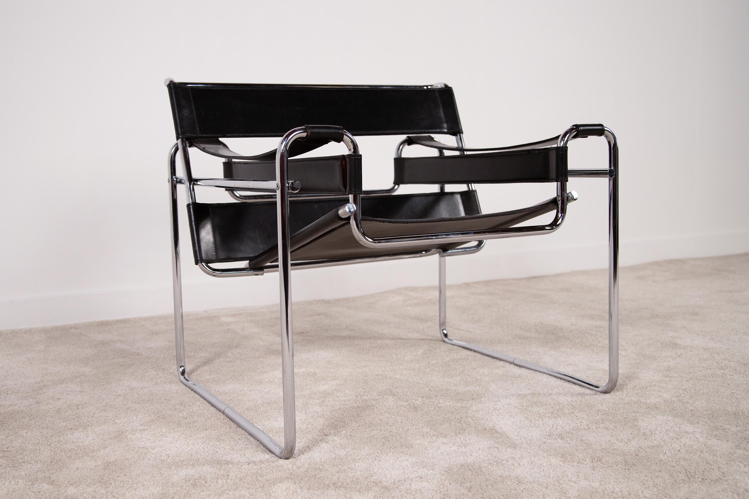 Wassily armchair designed by Marcel Breuer made of black leather and chromed metal tubular frame. The Wassily B3 Chair is an icon of twentieth-century modernism, ideal for furnishing any home setting with sophistication or adding a designer touch to