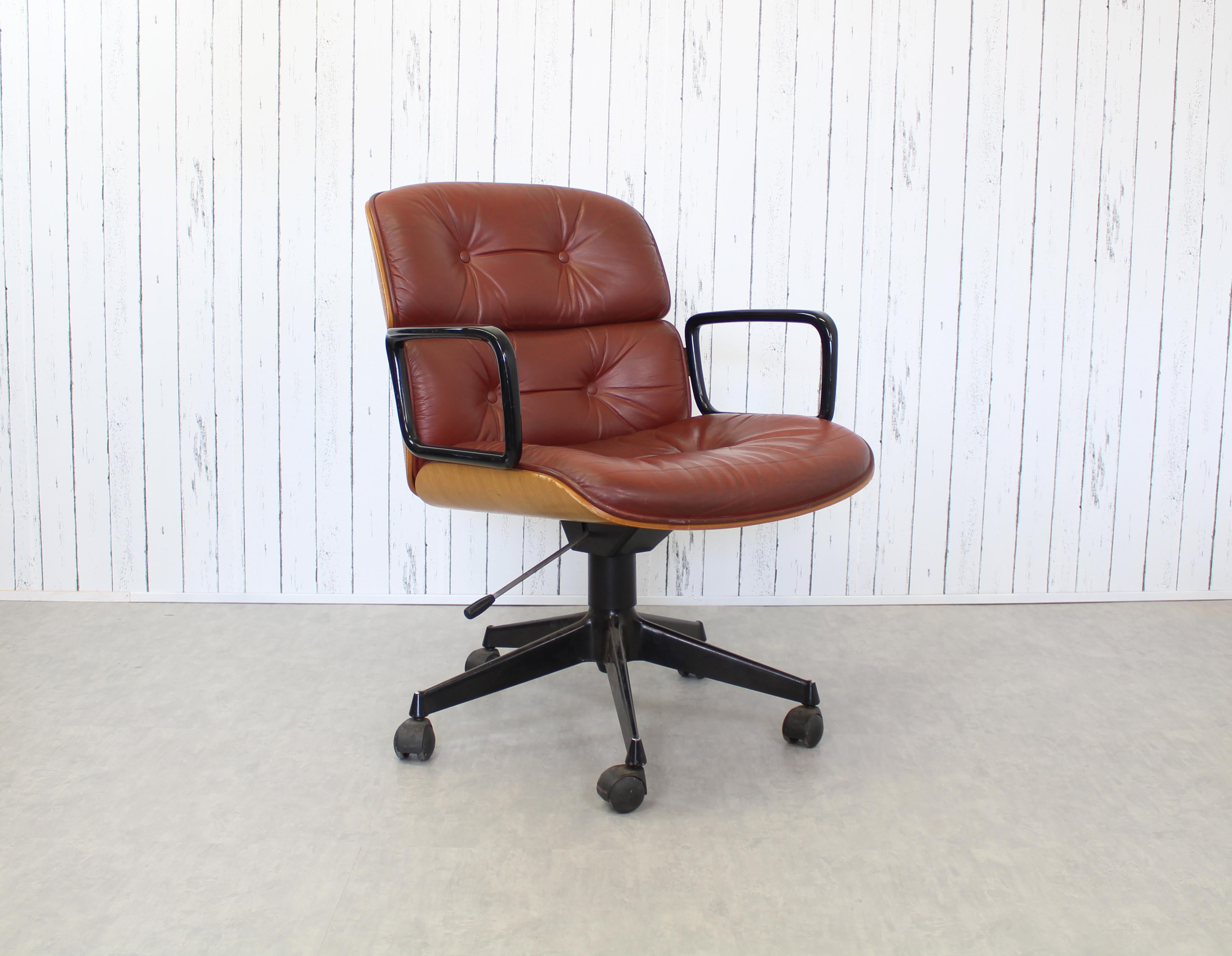 CONTACT FOR ACTUAL SHIPPING COSTS.

Office armchair production Mim design Ennio Fazioli 1960s. Curved wooden shell, upholstered seat and back covered in original ochre-colored fabric. Four-spoke cast aluminum base with swivel casters, manufacture