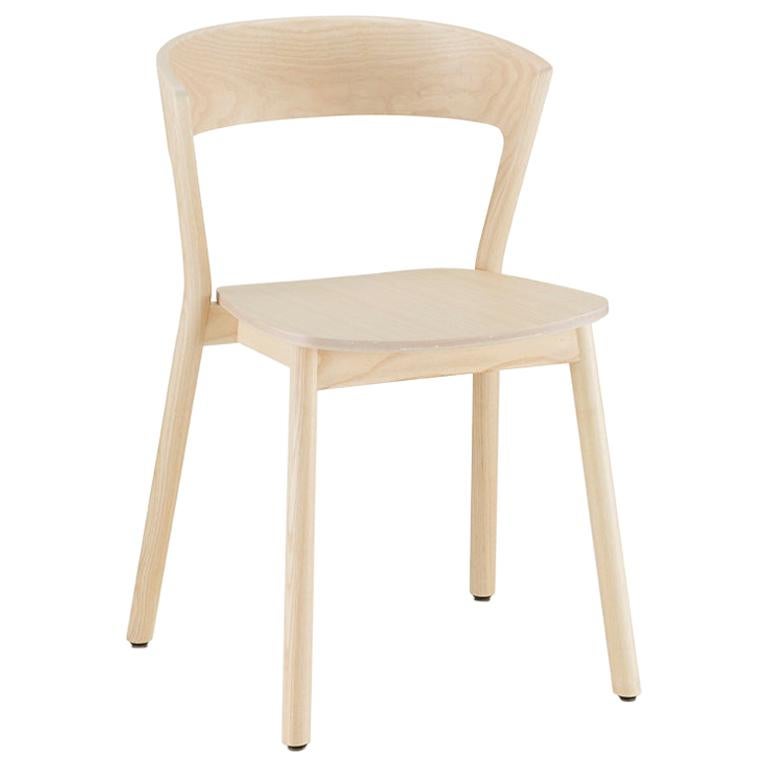 Edith chair in solid ash varnish and wood  seat by Massimo Broglio