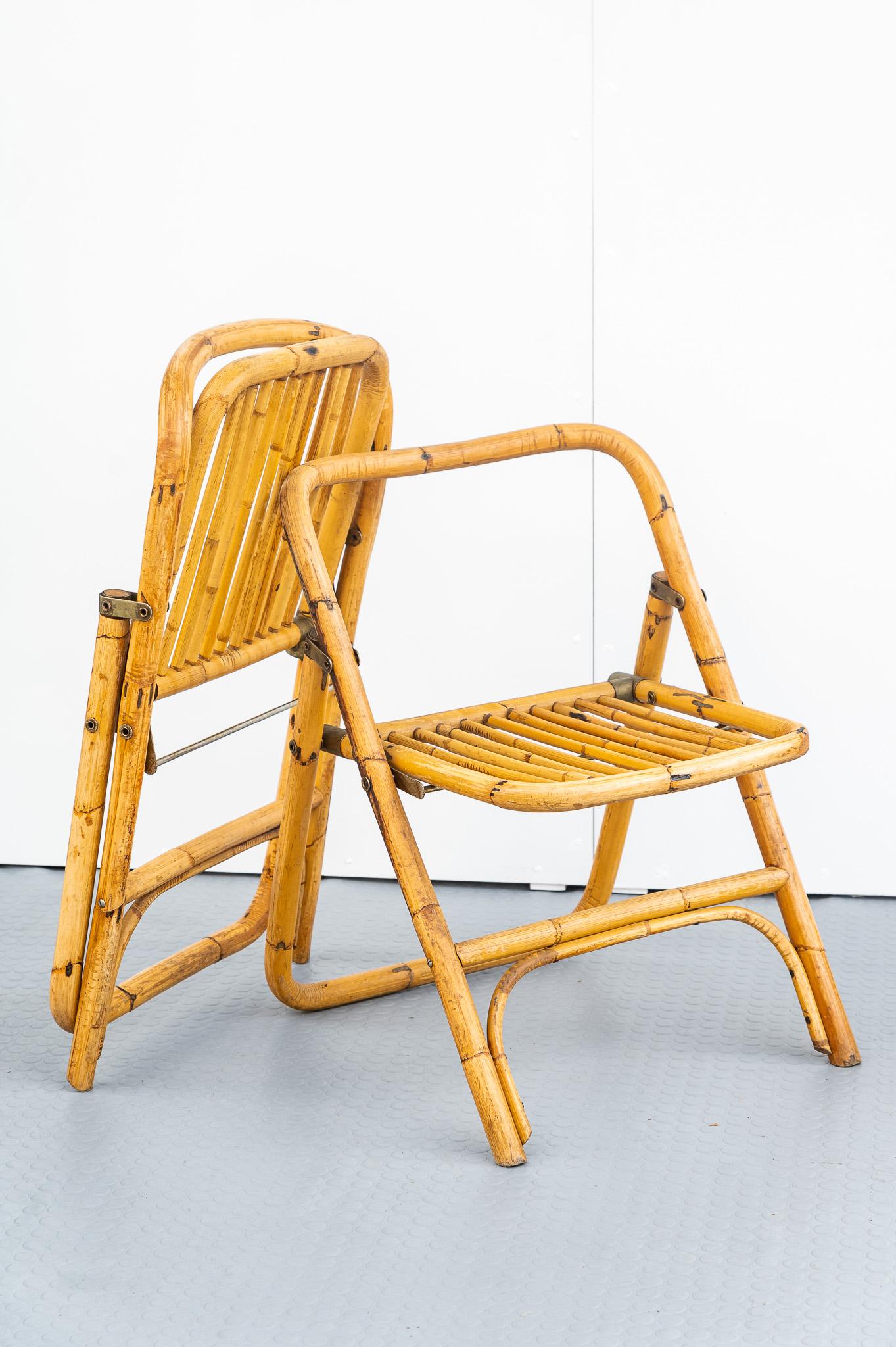 Dal Vera bamboo folding chair, 1950s, Made in Italy. 
Set of four bamboo folding chairs attributed to Dal Vera, restored and in excellent condition. 
Restored while maintaining the patina of time.  
The price of shipping is for the Italian