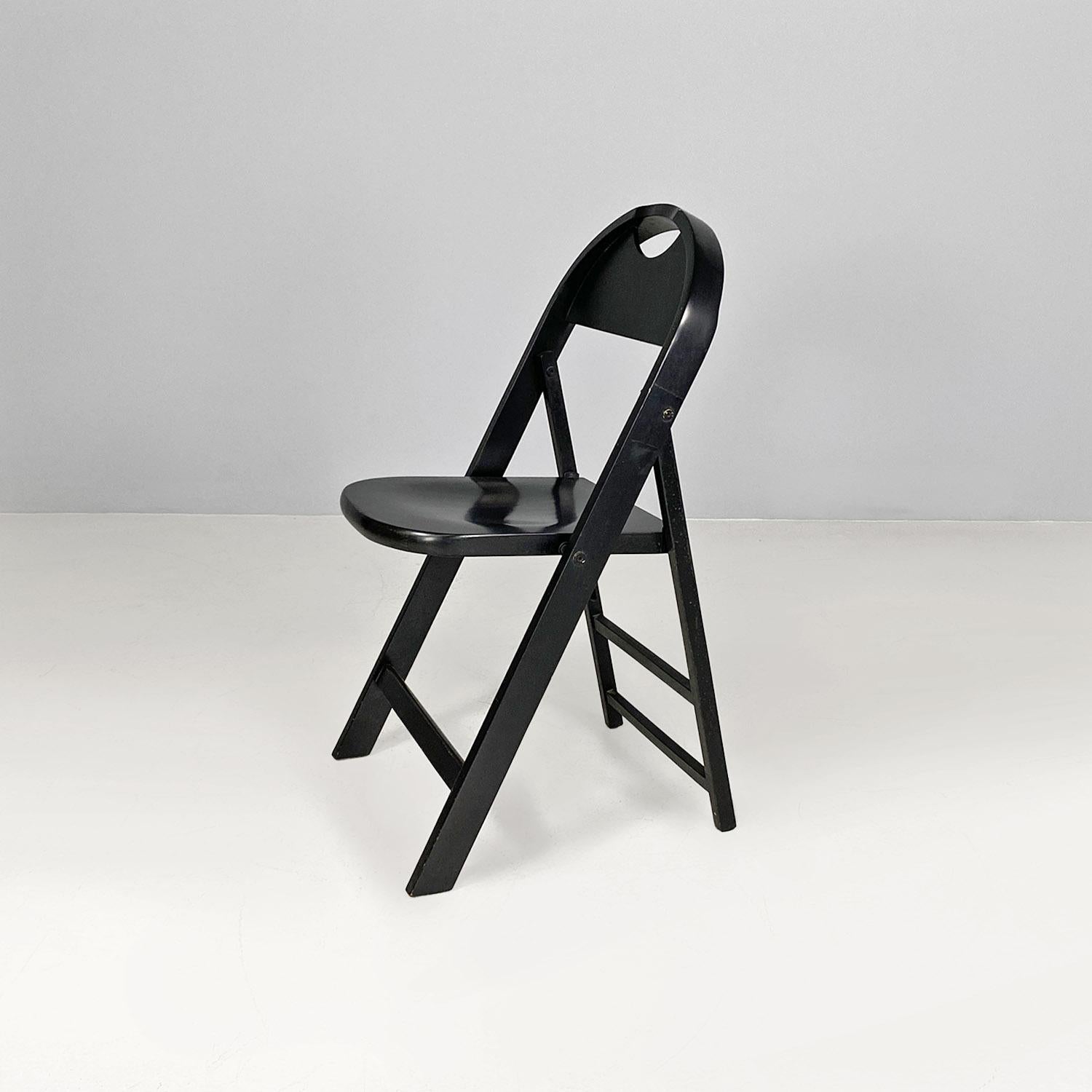 Mid-20th Century Italian folding chair, black wood, Achille and Pier Giacomo Castiglioni 1960s For Sale