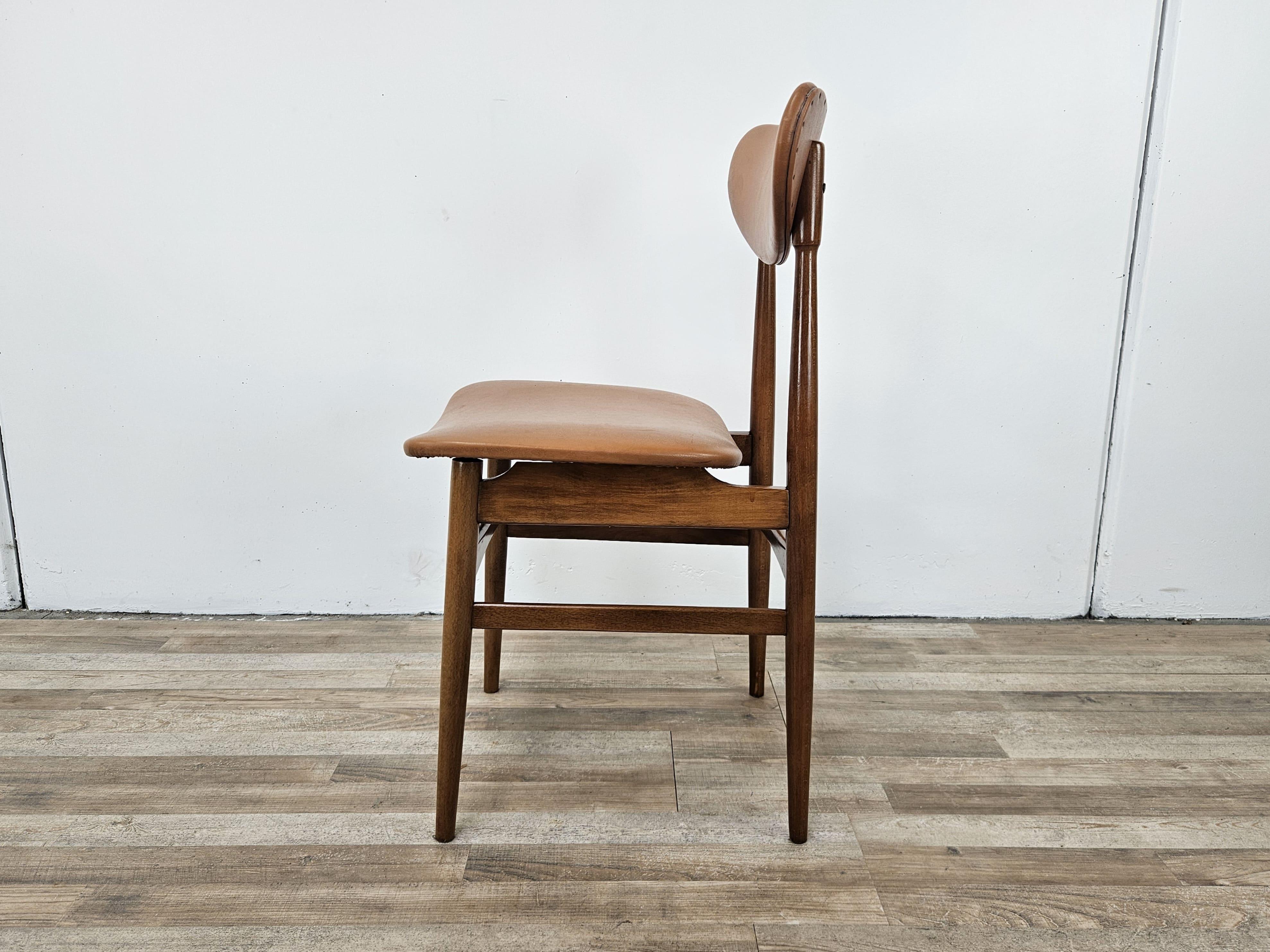 Italian Scandinavian 1970s teak and brown skai chair For Sale