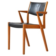 Sedia scandinava in teak e similpelle