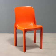 'Selene' chair by Vico Magistretti Anni 60-70 in orange plastic.