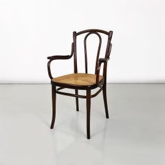 Austrian antique wooden and Vienna straw Thonet chair with armrests, 1900s