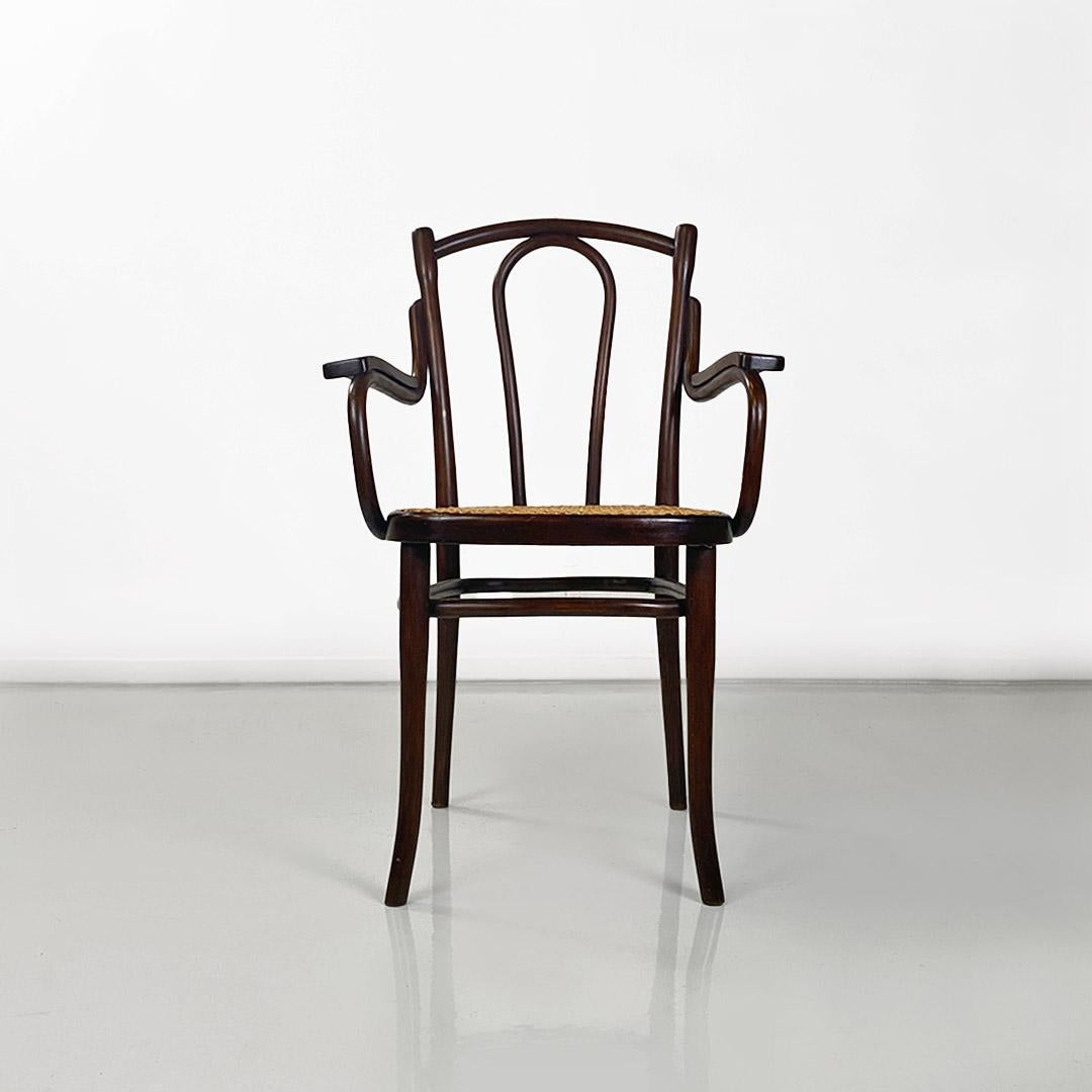 Austrian Thonet chair with arms made of wood and Vienna straw, Austria, early 1900s For Sale