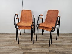 1960s bar chairs made of iron and orange woven plastic