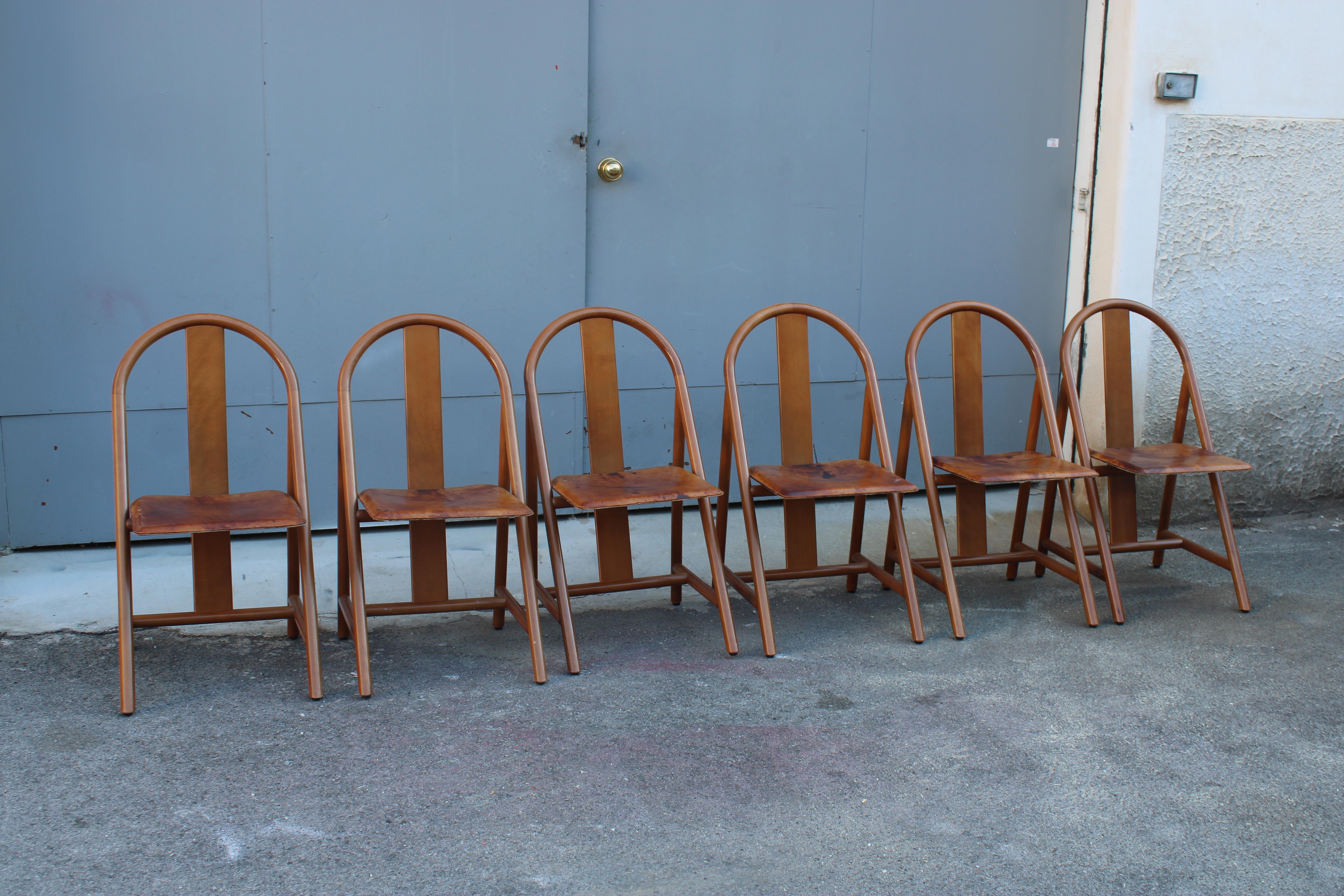 6 sedie in noce e cuoio design modernista 1970 