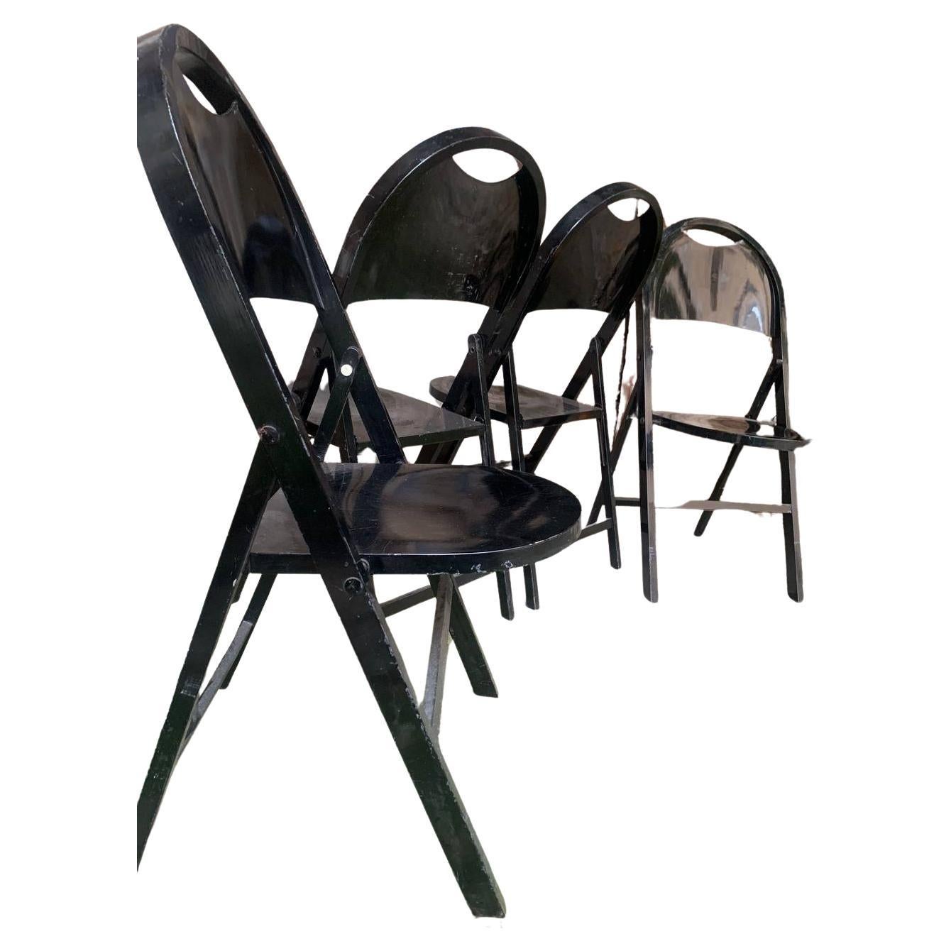 Sedie moderne italiane della metà del secolo Tric di Achille Pier Giacomo Castiglioni anni '60
Set di tre sedie pieghevoli mod. Tric interamente in legno verniciato nero. La seduta e lo schienale sono arrotondati. Le gambe sono a sezione