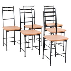 Sillas Ycami años 80 aluminio anodizado pintado de negro con asiento de cuero co