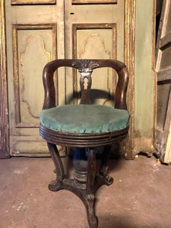 Solid walnut chair with moved back and swivel seat, italy