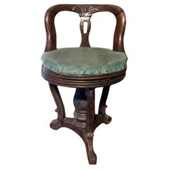 Solid walnut chair with moved back and swivel seat, italy