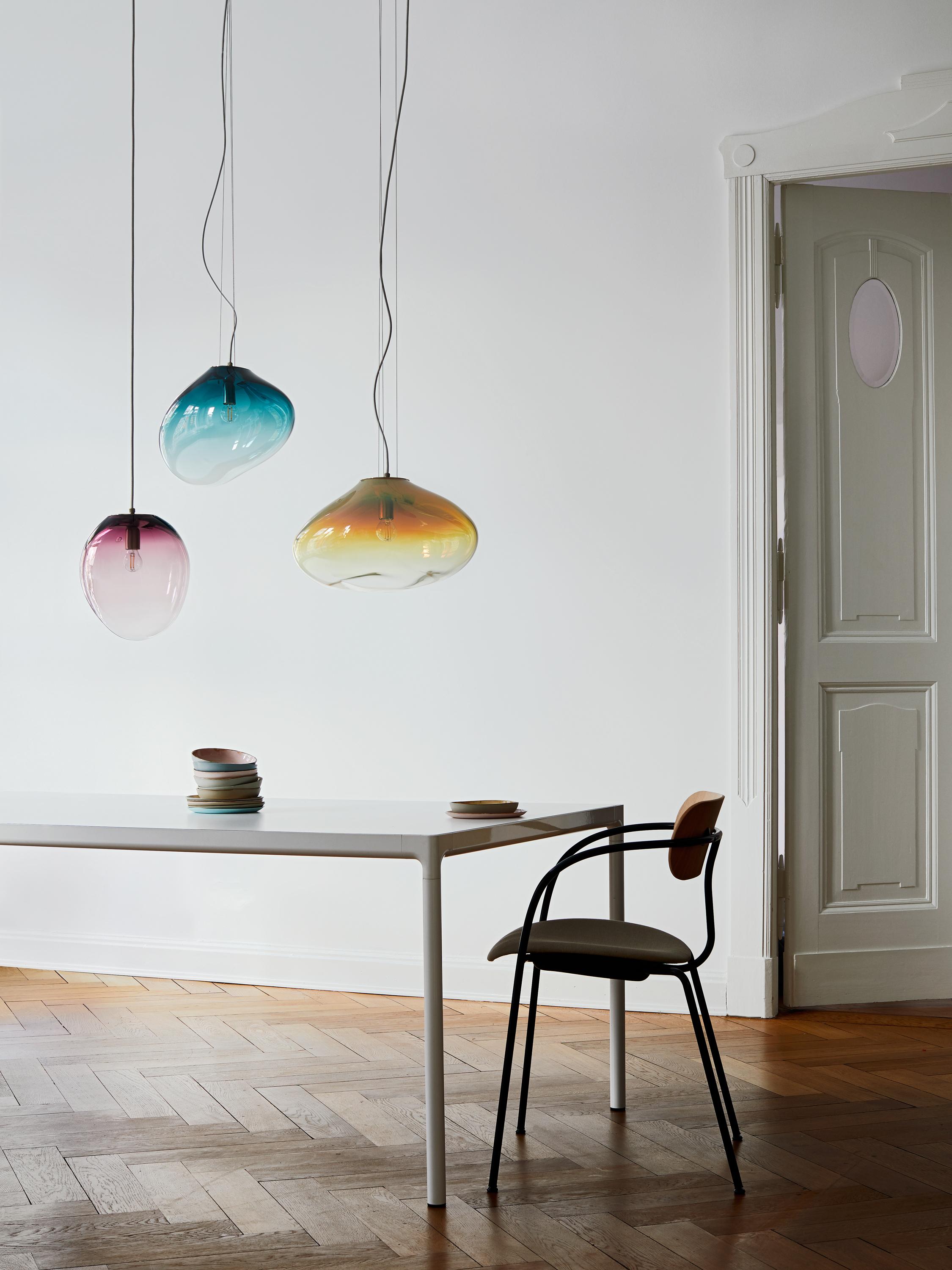 Solitary or in constellation, these lights create individual light concepts and associate with star constellations. 
Each glass piece is named after a star or a planet. 
They exist as hanging, floor, standing and wall luminaries.
The creator