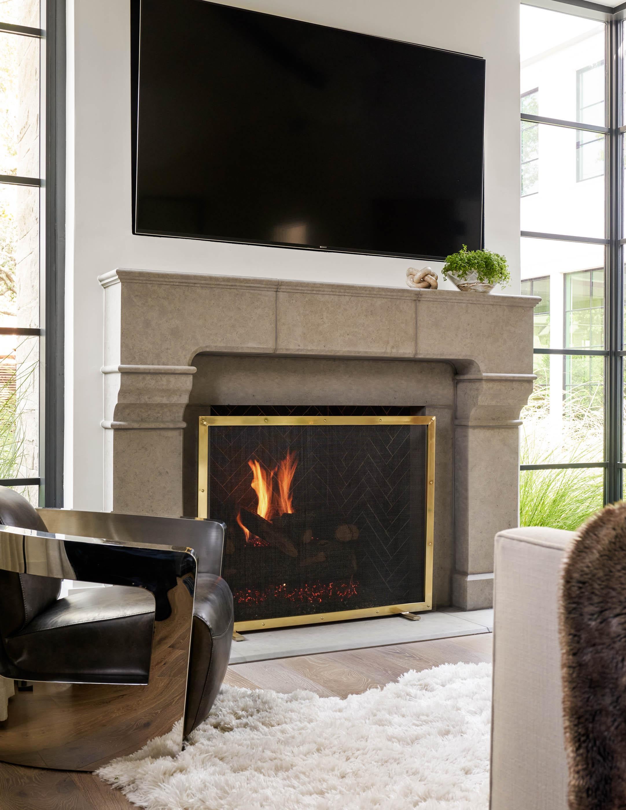 The Sedona Fireplace screen features a classic nail head design made of brass. This luxury fireplace screen design offers a timeless finishing detail for the fireplace. Not only will it protect against stray embers, but it will also serve as a