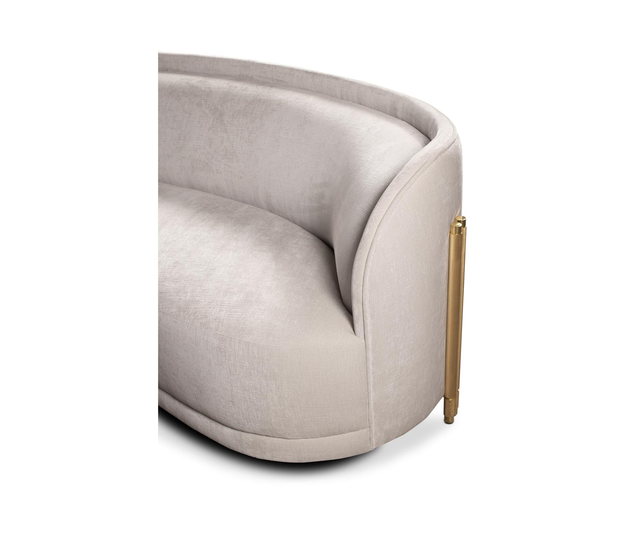 Seduire II Sofa by Memoir Essence
Dimensions: D 125 x W 280 x H 76 cm.
Materials: Knurled and polished brass and velvet upholstery.

Immerse in Memoir´s world with our new piece Seduire II, characterized by an organic and opulent shape, this sofa