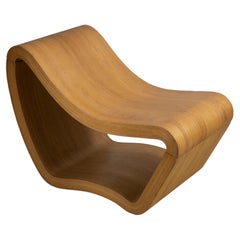 Seduta scultorea in legno curvato, produzione italiana anni 70
