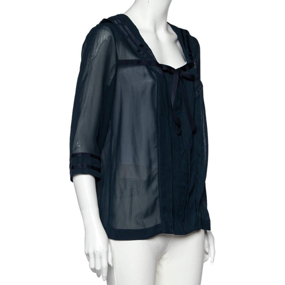 This top from See by Chloe has been made to befit a varied range of outfits. This midnight blue piece will make a remarkable statement no matter where you wear it to. Made from fine crepe, this top has a pleated sailor collar, elbow-length sleeves