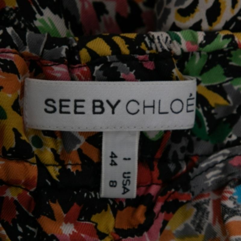 Chic e colorato, See By Chloe ti propone questo bellissimo abito per il tuo guardaroba estivo. È realizzata in tessuto di seta stampato multicolore e presenta spalline sottili. È dotato di due tasche. Fai una dichiarazione di moda chic indossando